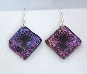 Drop glass earrings.