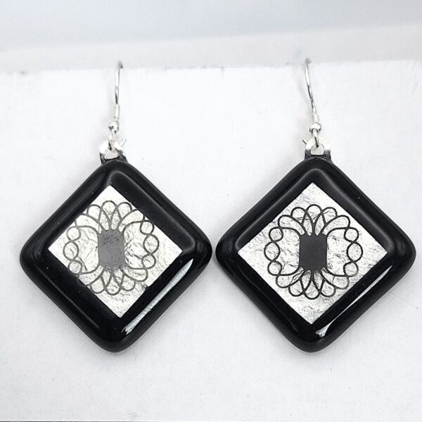 Drop glass earrings.